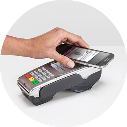 Hold your phone over the payment terminal